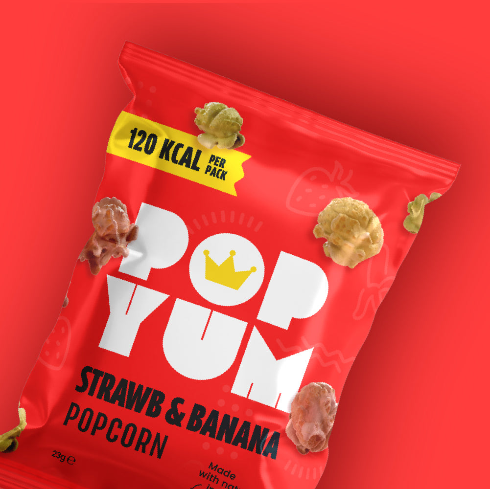 A red bag of Pop Yum gluten-free strawberry and banana popcorn on a red background. 120 kcal per pack is also displayed.