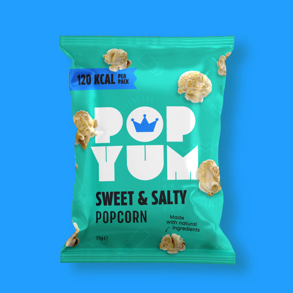 Teal packet of Pop Yum sweet & salty-flavoured popcorn on a blue background. Vegan & gluten-free snack. 